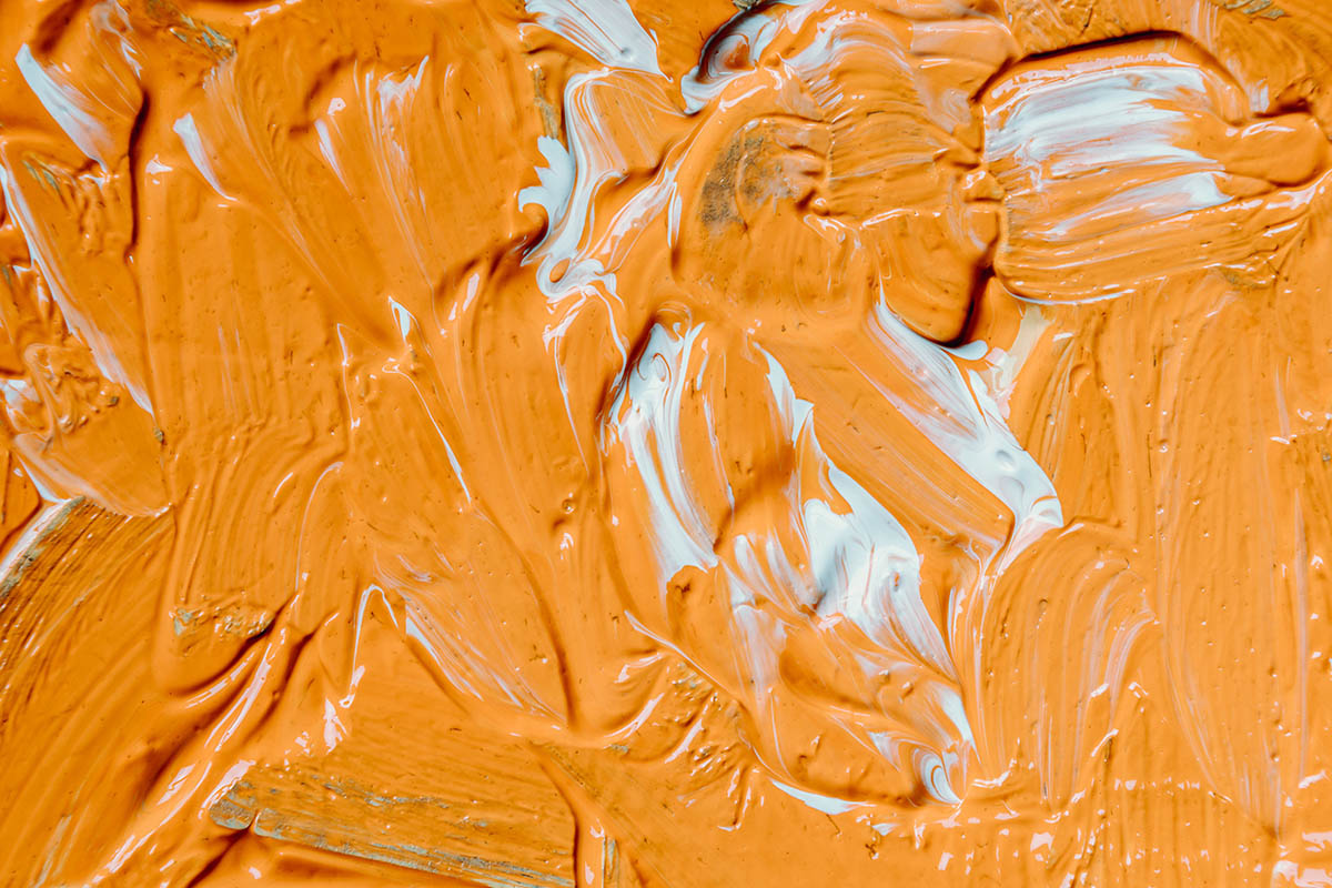 Wet Orange and White Paint Filling Frame