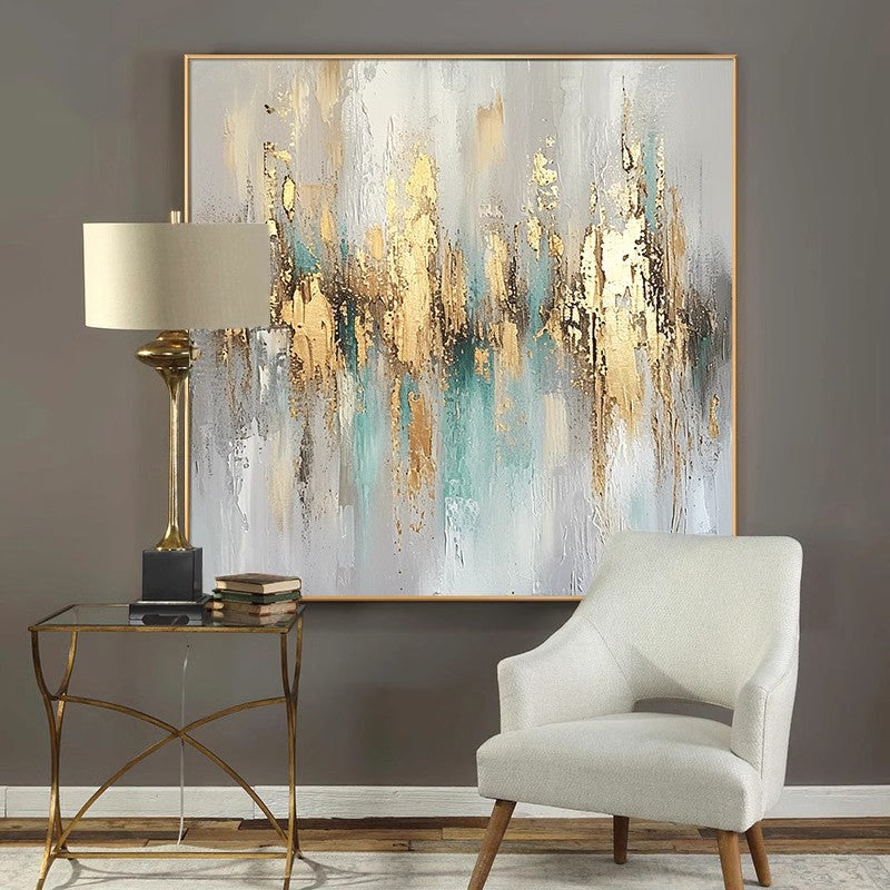 Gold environmentally friendly frame art painting behind the white sofa chair
