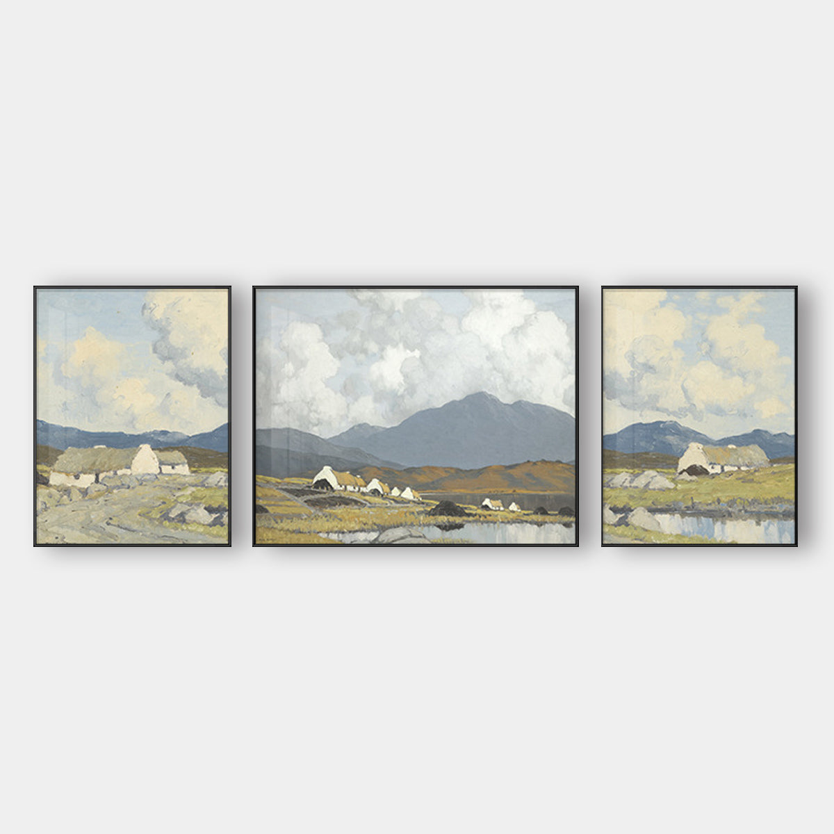 Three abstract paintings hanging on the living room sofa background wall
