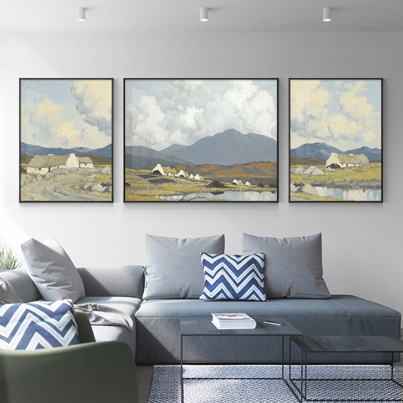 Three abstract paintings hanging on the living room sofa background wall SenroArt