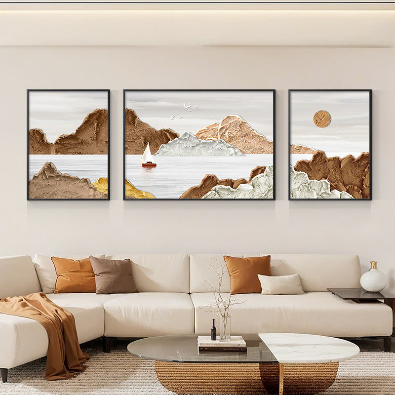 Three brown landscape paintings hanging on the sofa wall in the living room SenroArt