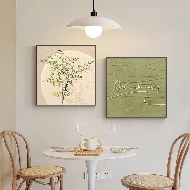 Two decorative paintings behind the wabi-sabi style dining table SenroArt